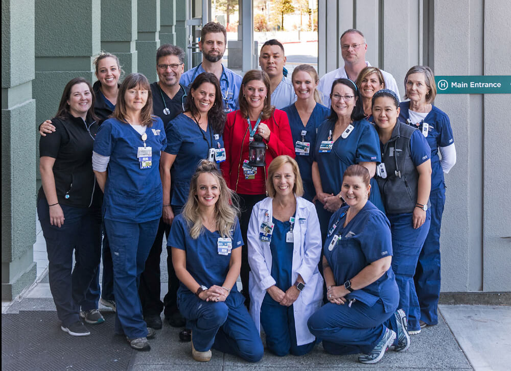 ER staff in front of building