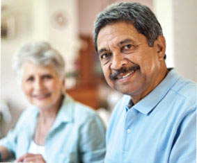 man and woman smiling