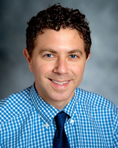 Portrait of Dr. Alex Metzger